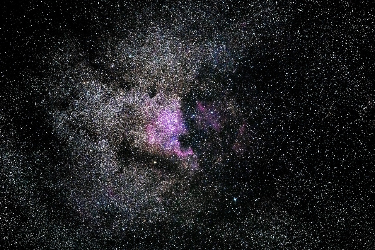 Dense Star Cluster with Purple Nebula
