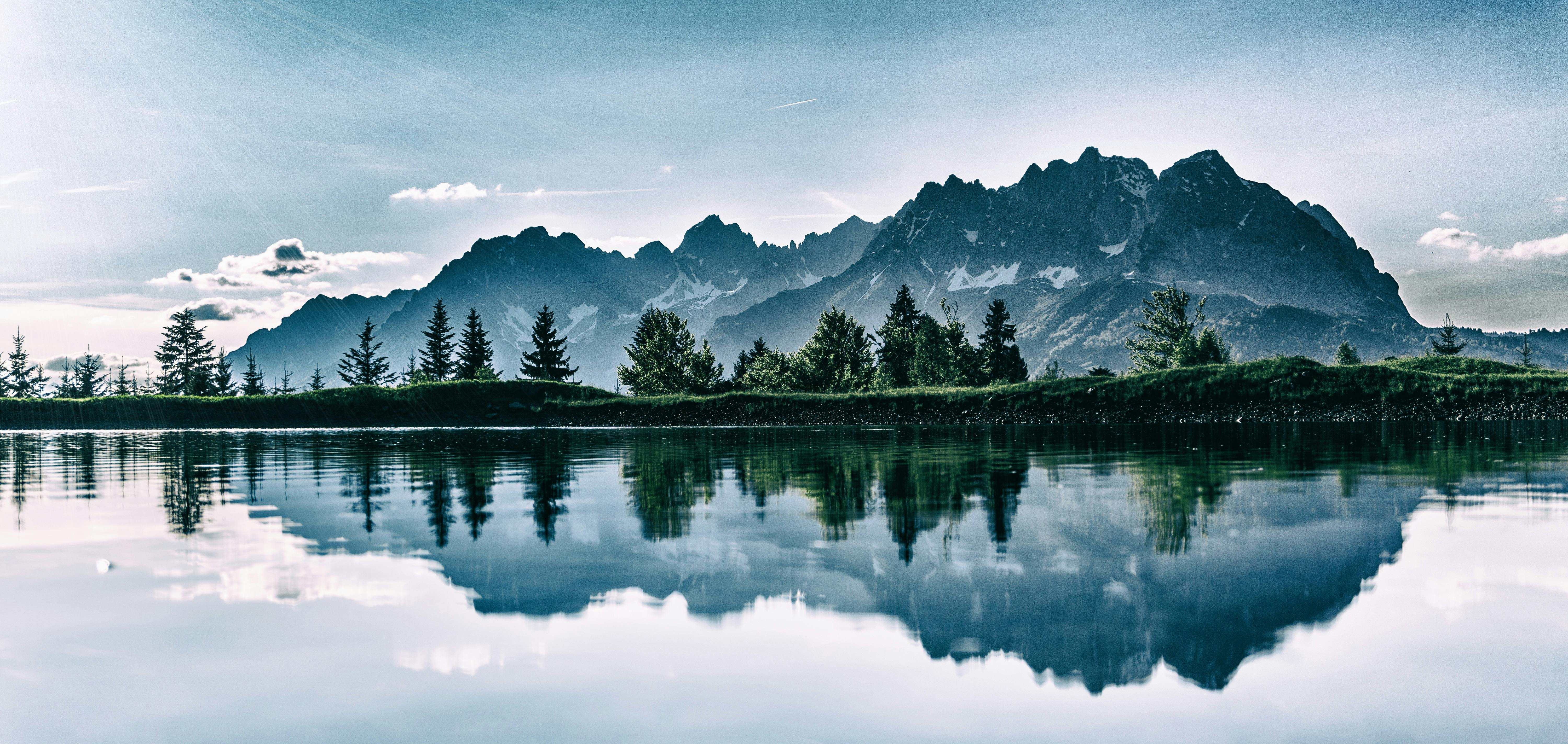 Misty Alpine Lake Reflection