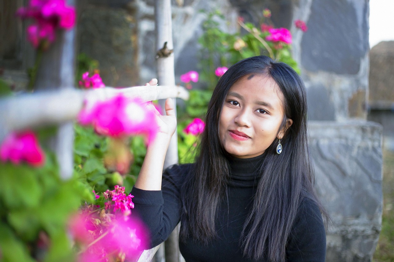 Portrait Framed by Pink Blossoms