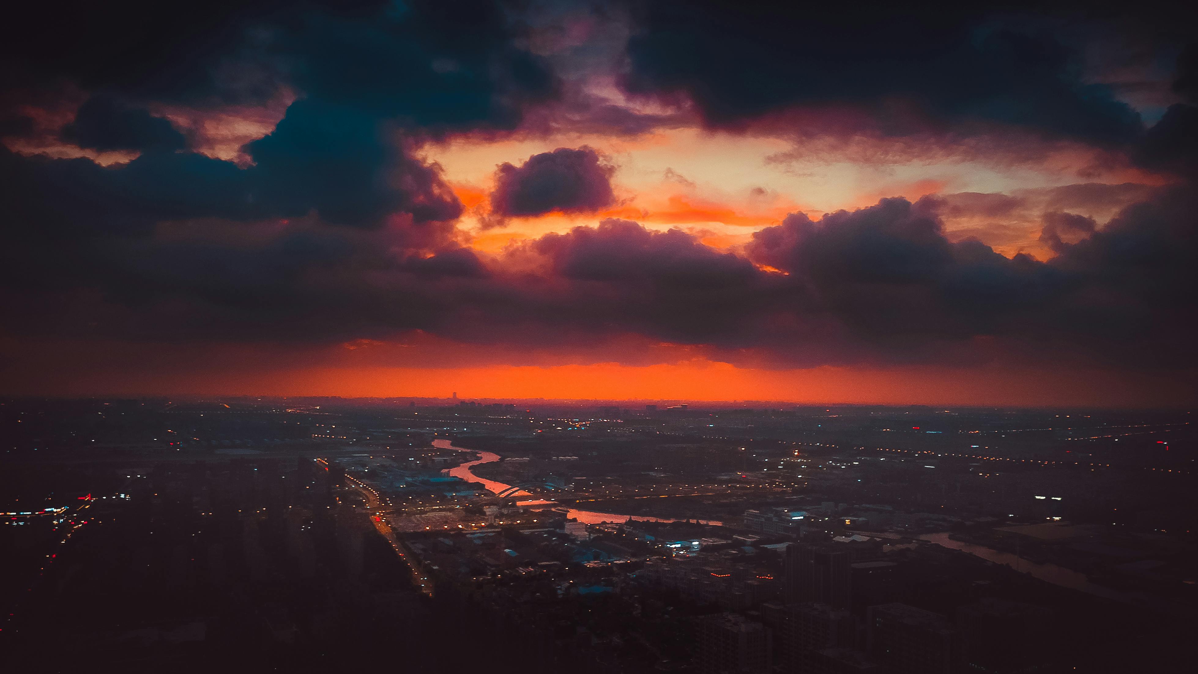 Stormy City Skyline at Sunset